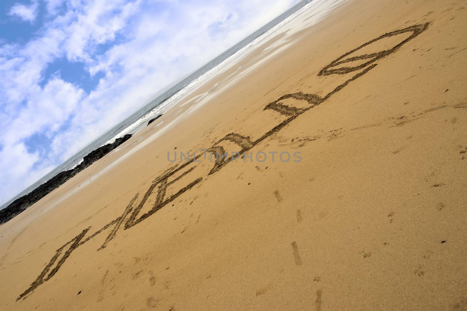 Hello inscribed on a sandy beach in Ballybunion Ireland