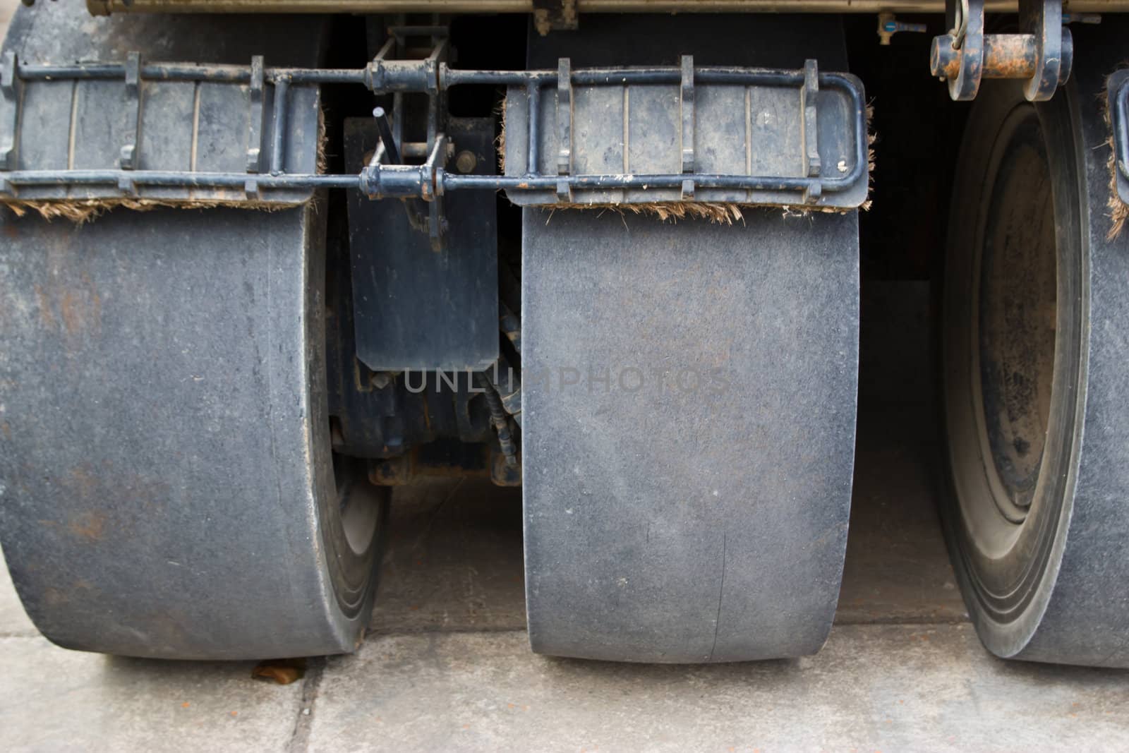 Road roller at a road construction site  by wasan_gredpree