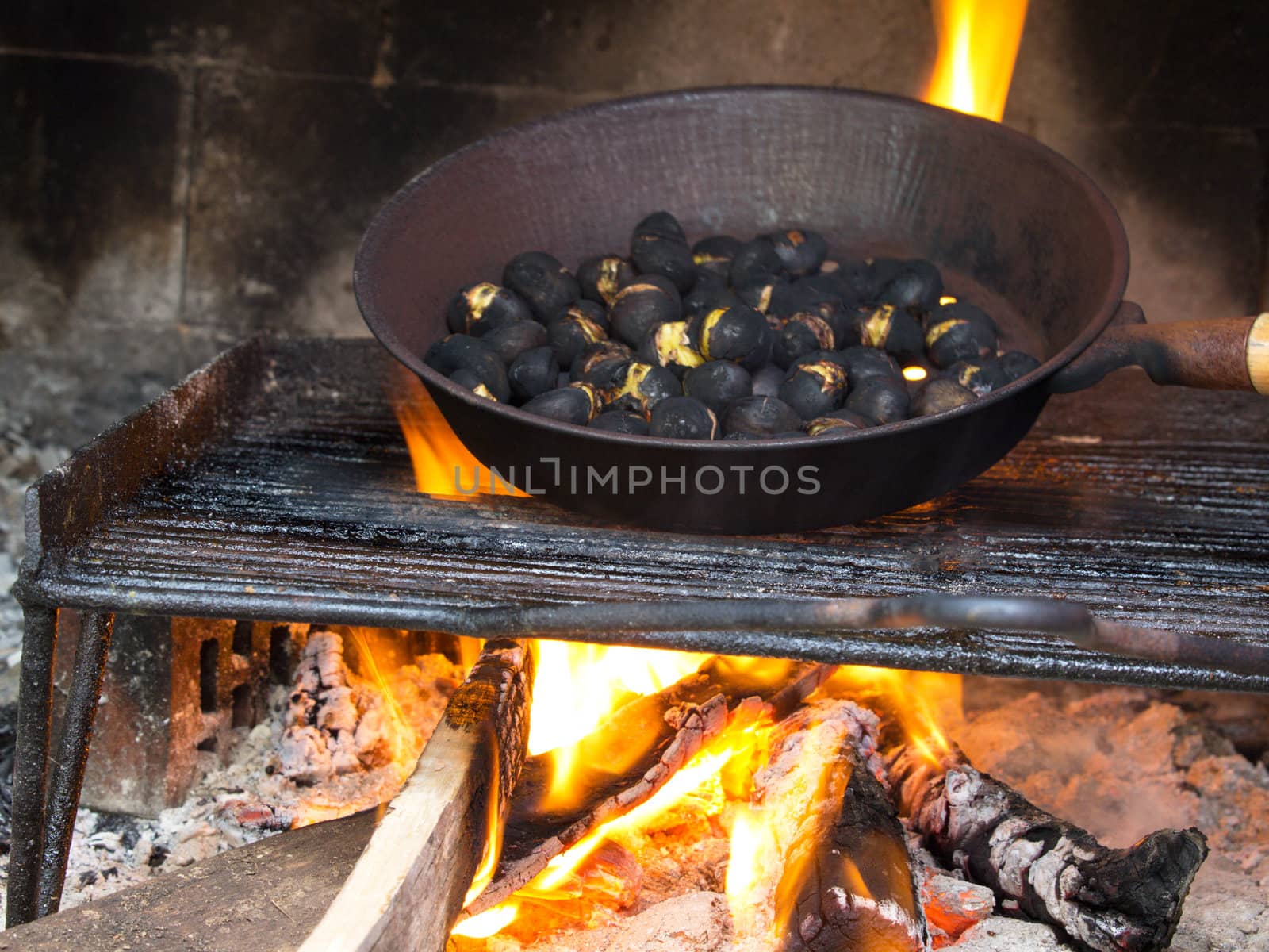 rosted chestnuts in the fireplace