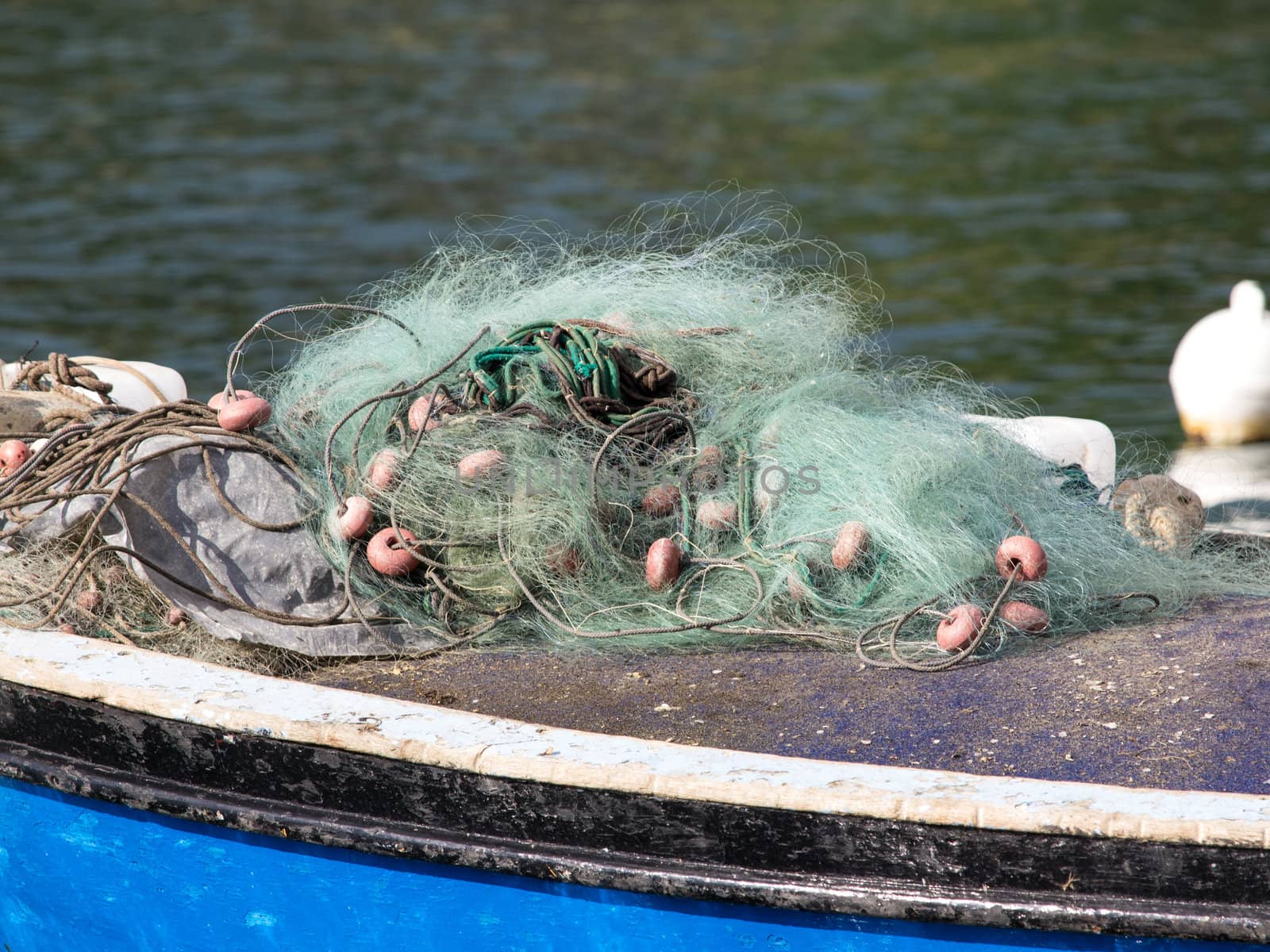 fishing net on the blue boat