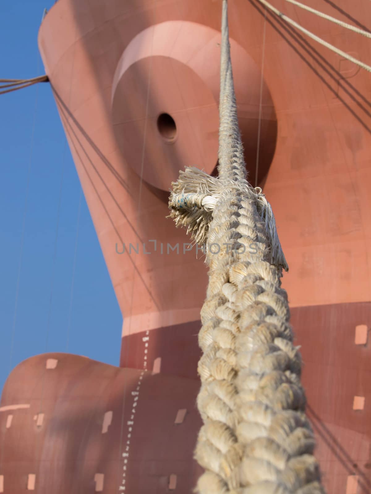 ropes on the bulb of a new boat in the shipyard