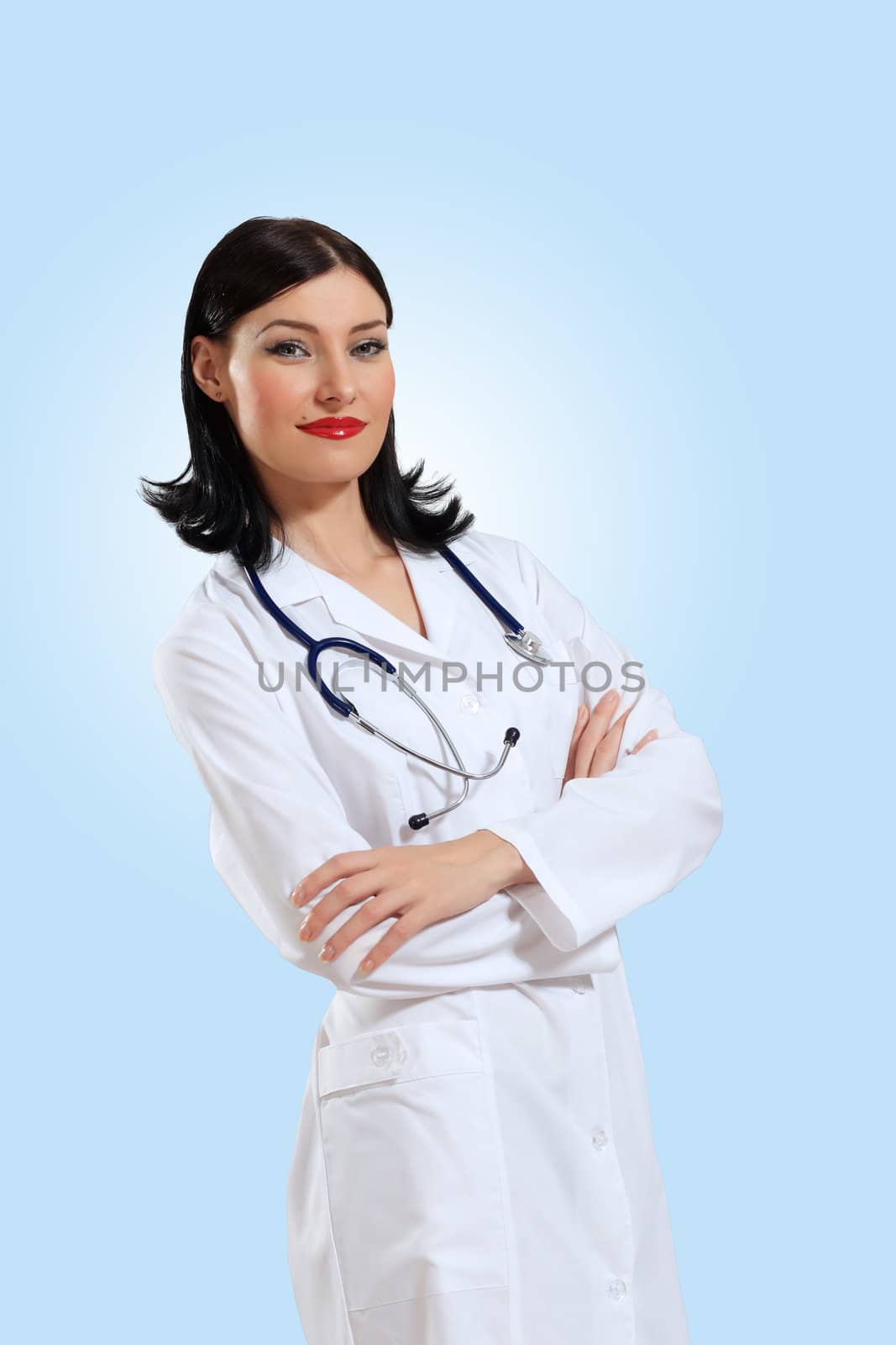 Portrait of happy successful young female doctor holding a stethoscope