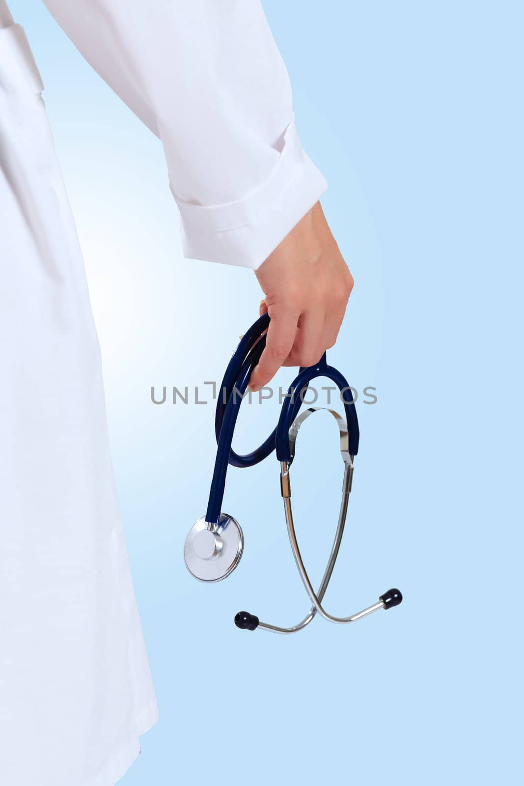 Portrait of happy successful young female doctor holding a stethoscope