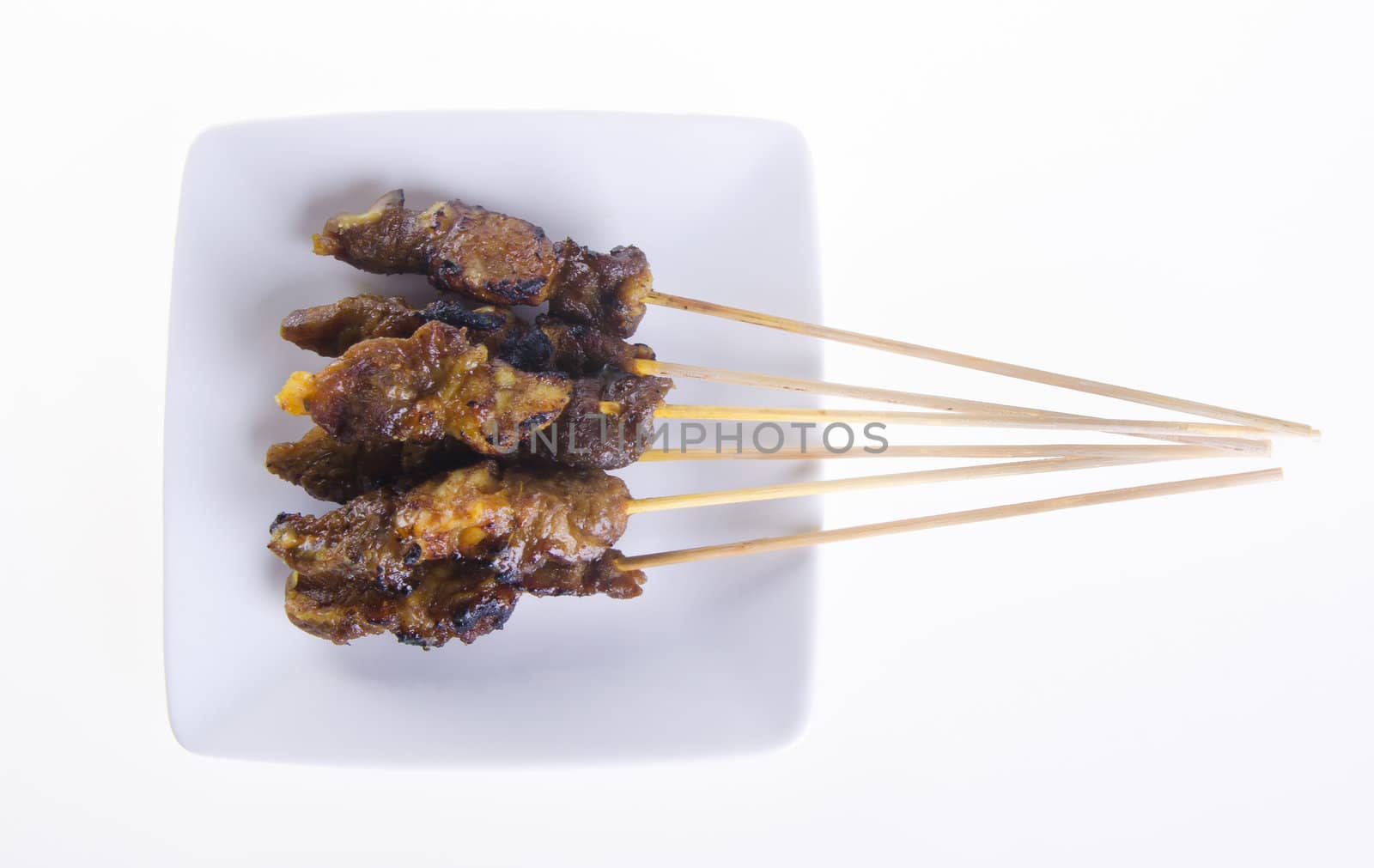 Satay. Asian cuisine - Satay on a background