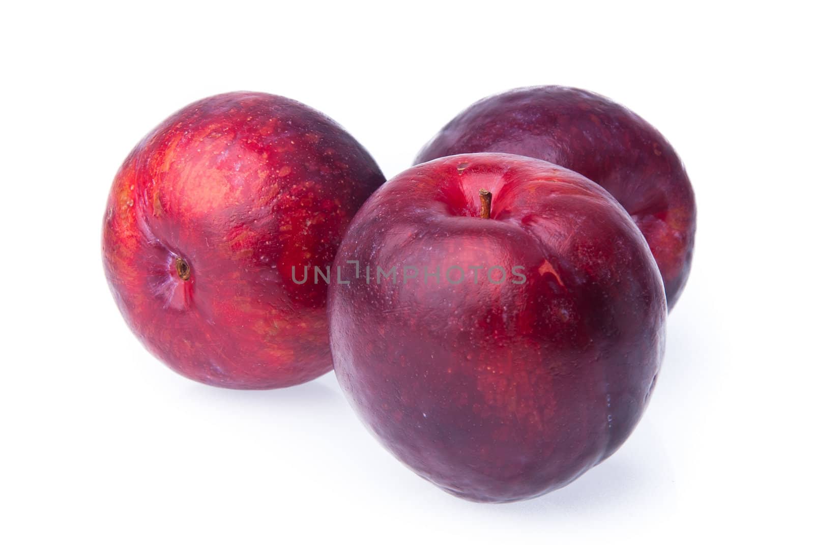 Plum. Ripe plum fruit on the background