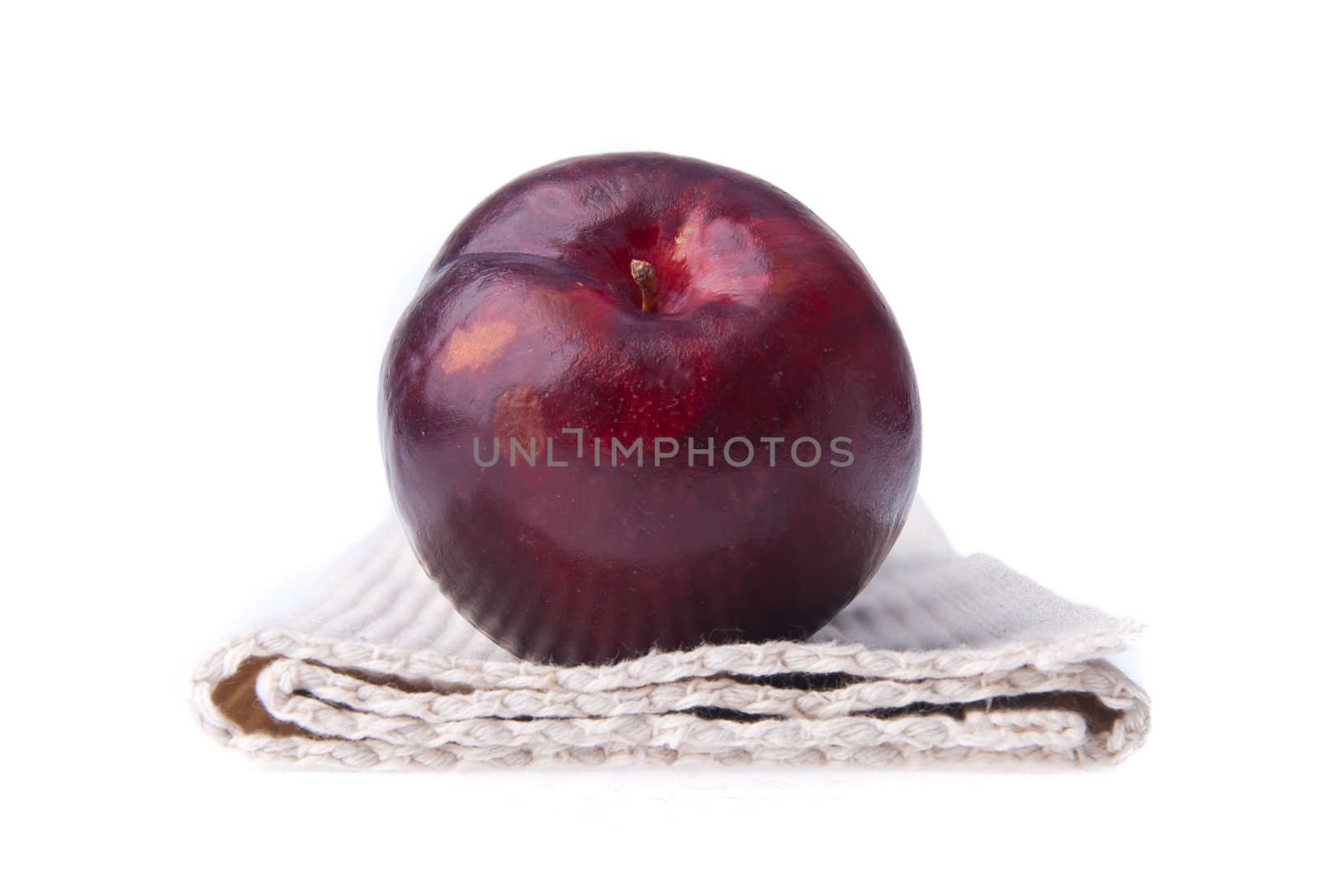 Plum. Ripe plum fruit on the background