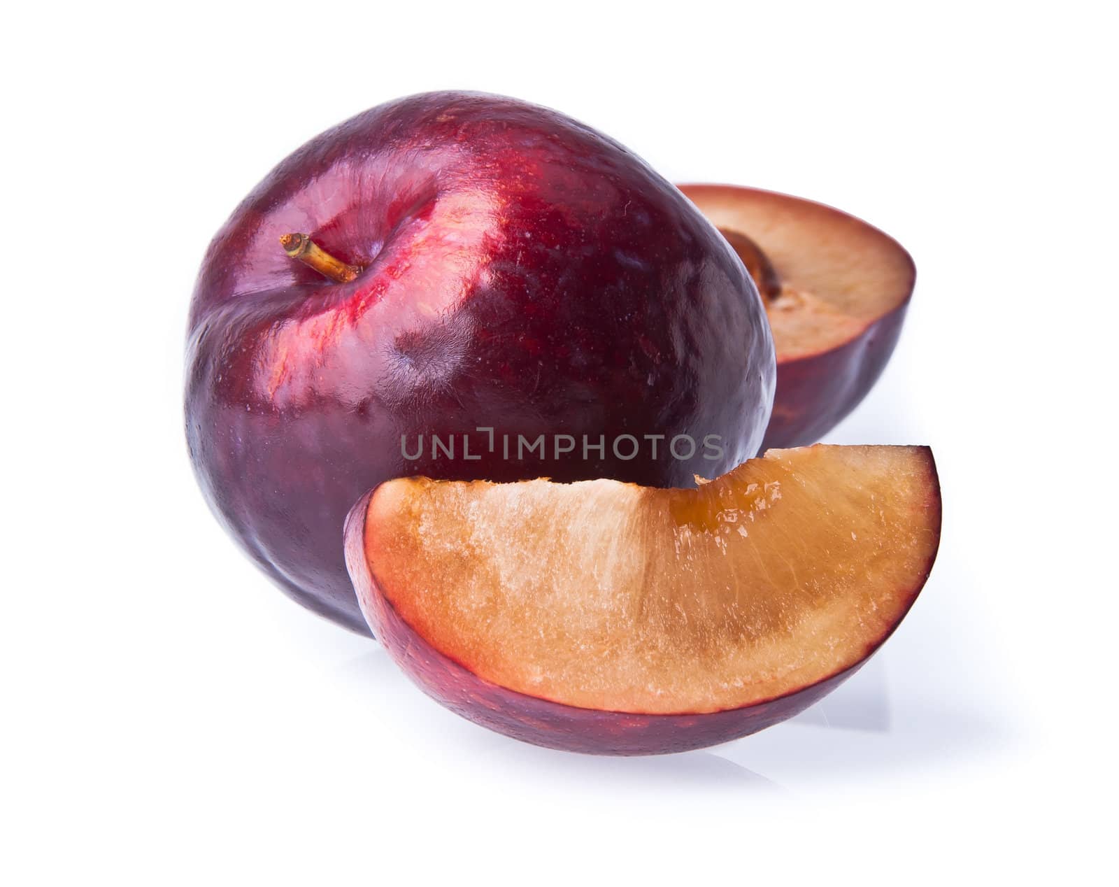 Plum. Ripe plum fruit on the background