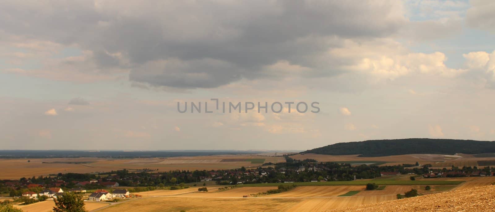 Panorama of northern French countryside and harvested wheat fields
