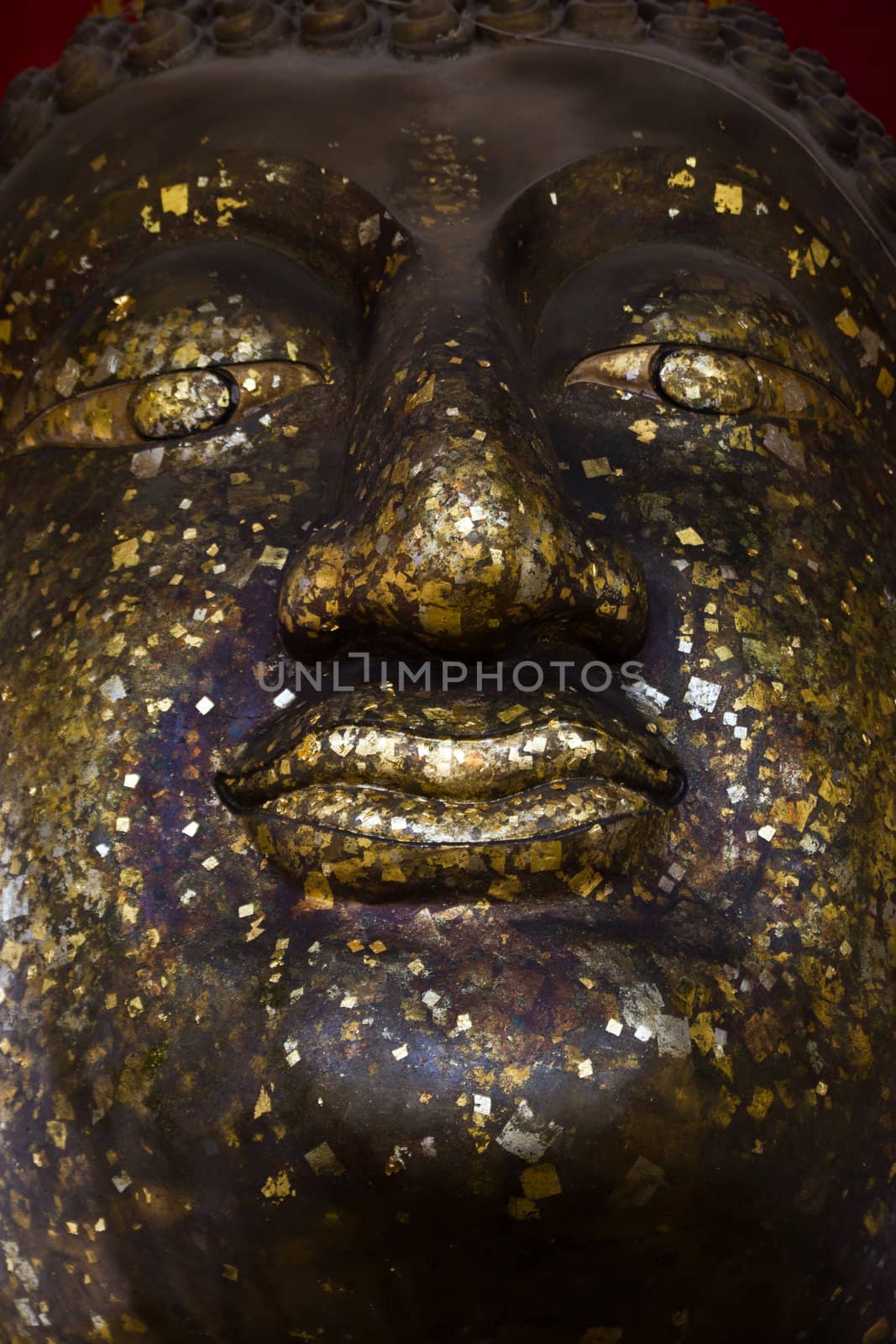 ancient Buddha face, Ayutthaya, Thailand  by wasan_gredpree
