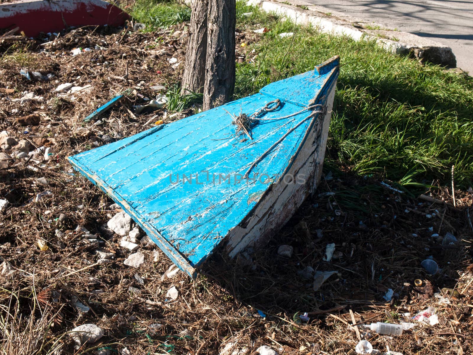 wooden boat broken on the coast after the storm