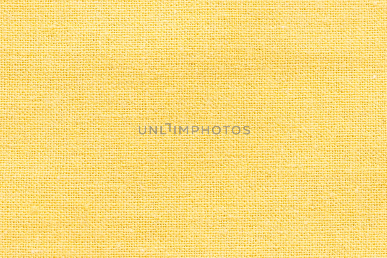 Close up shot of yellow seamless fabric texture
