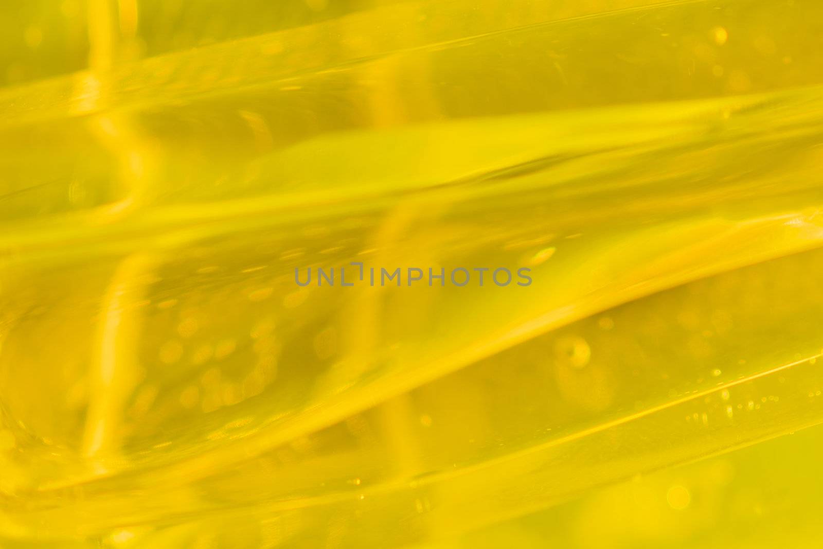 close-up shot of abstract golden glass background