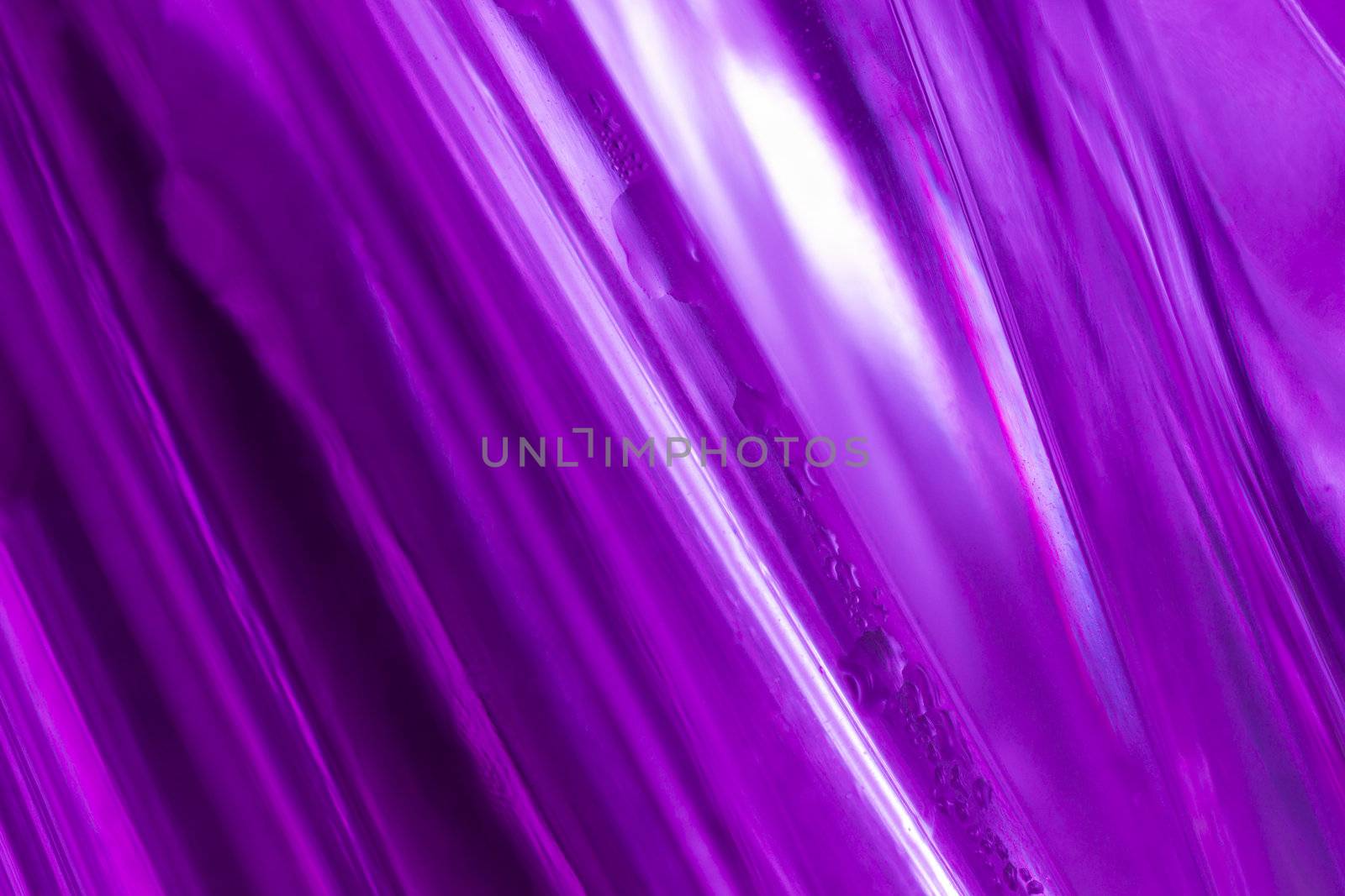 close-up shot of a abstract violet glass background