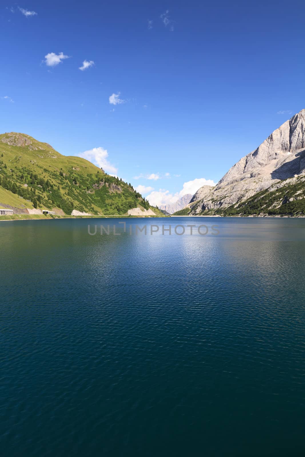 summer view of Fedaia lake and pass, Trentino, Italy