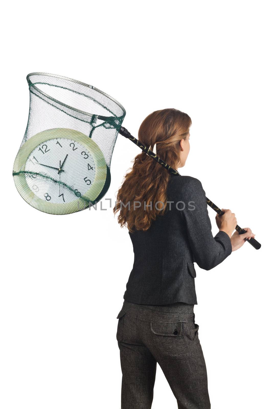 Businesswoman with net and clocks