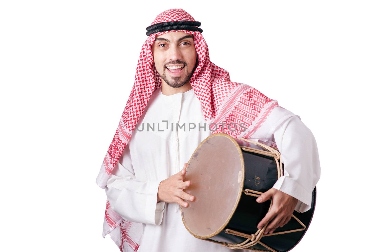 Arab man playing drum isolated on white by Elnur