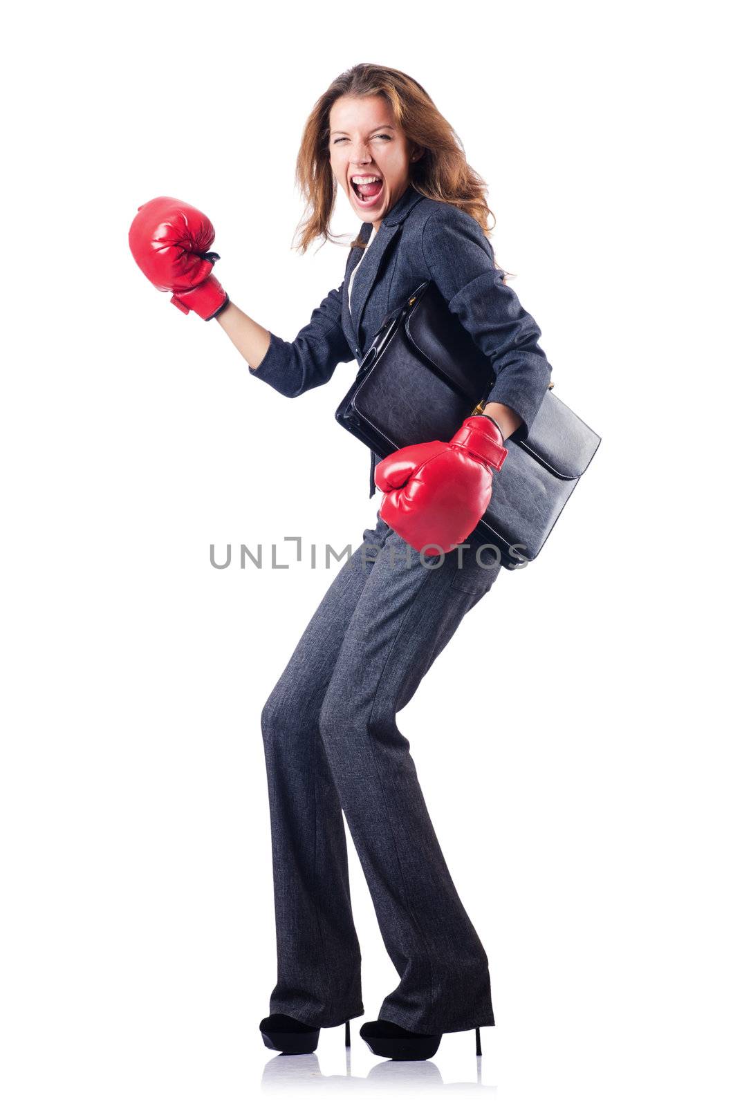 Woman businesswoman with boxing gloves on white