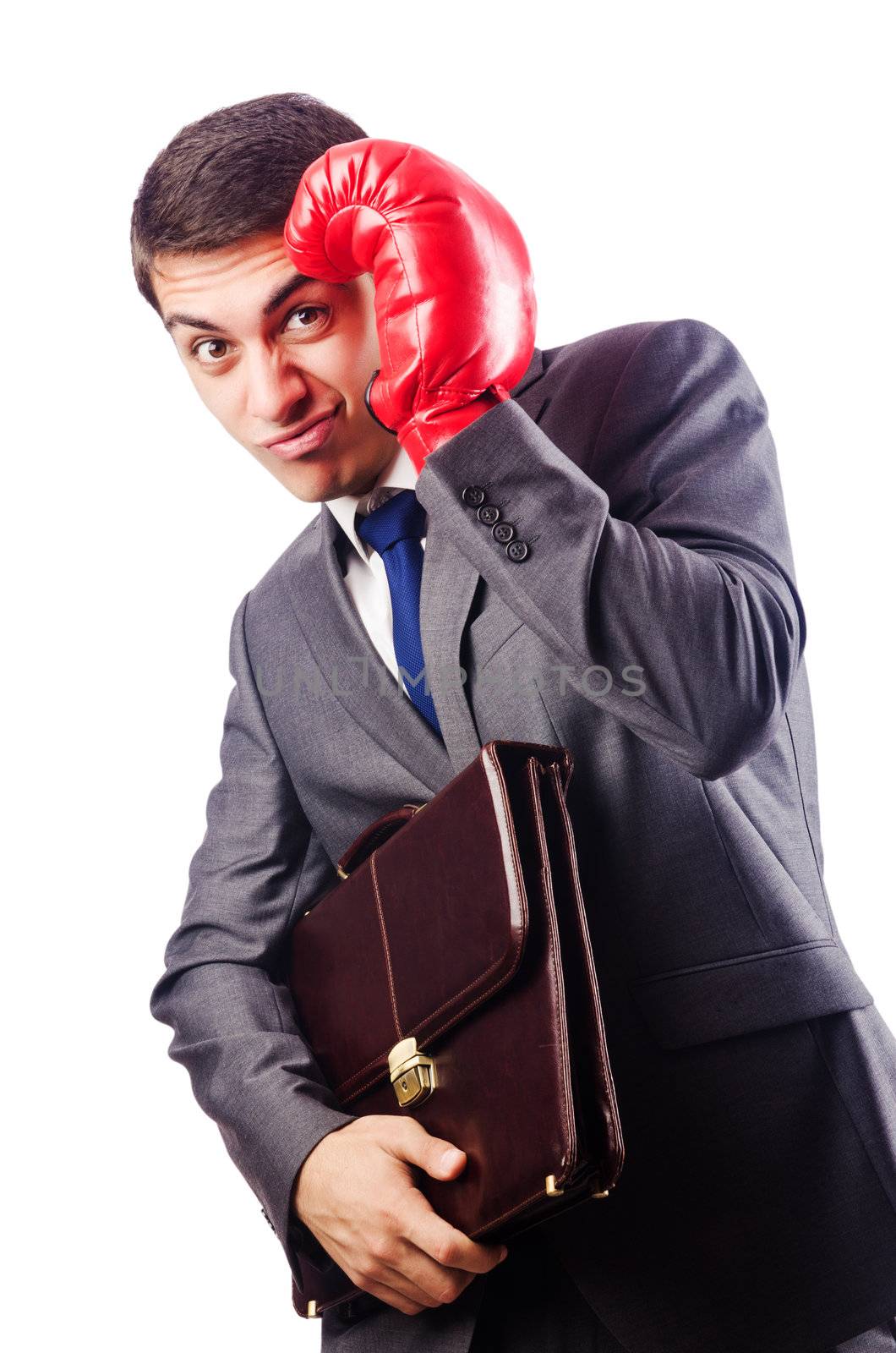 Businessman with boxing gloves on white