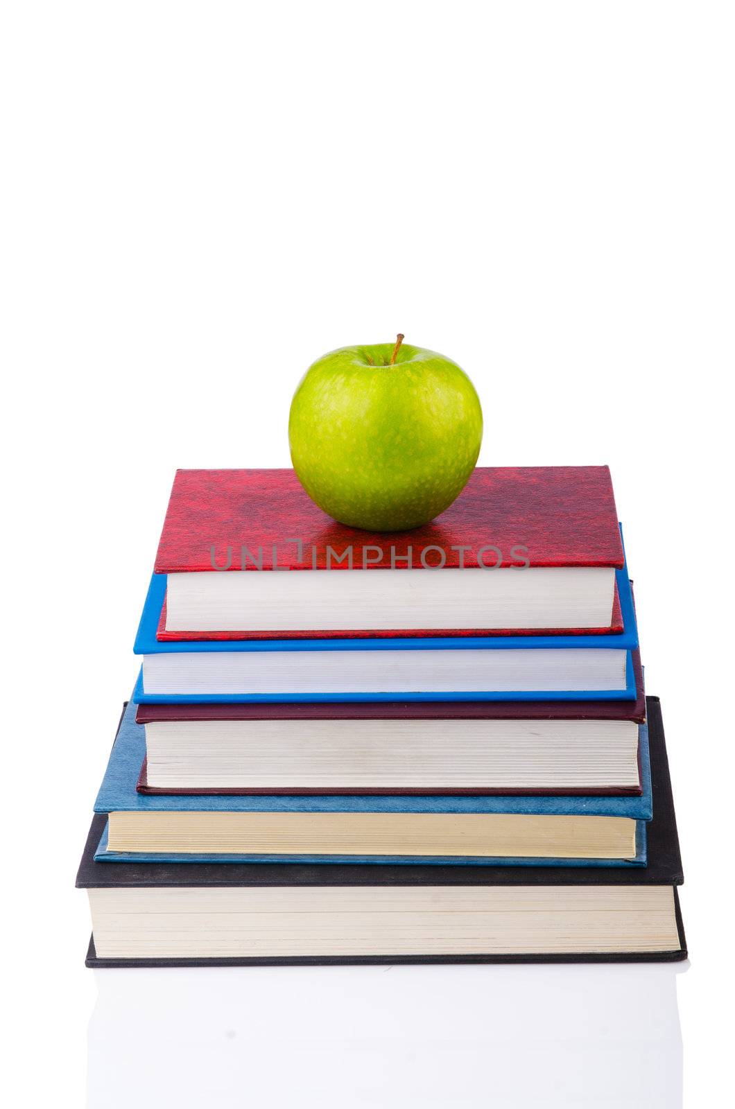 Back to school concept with books and apple