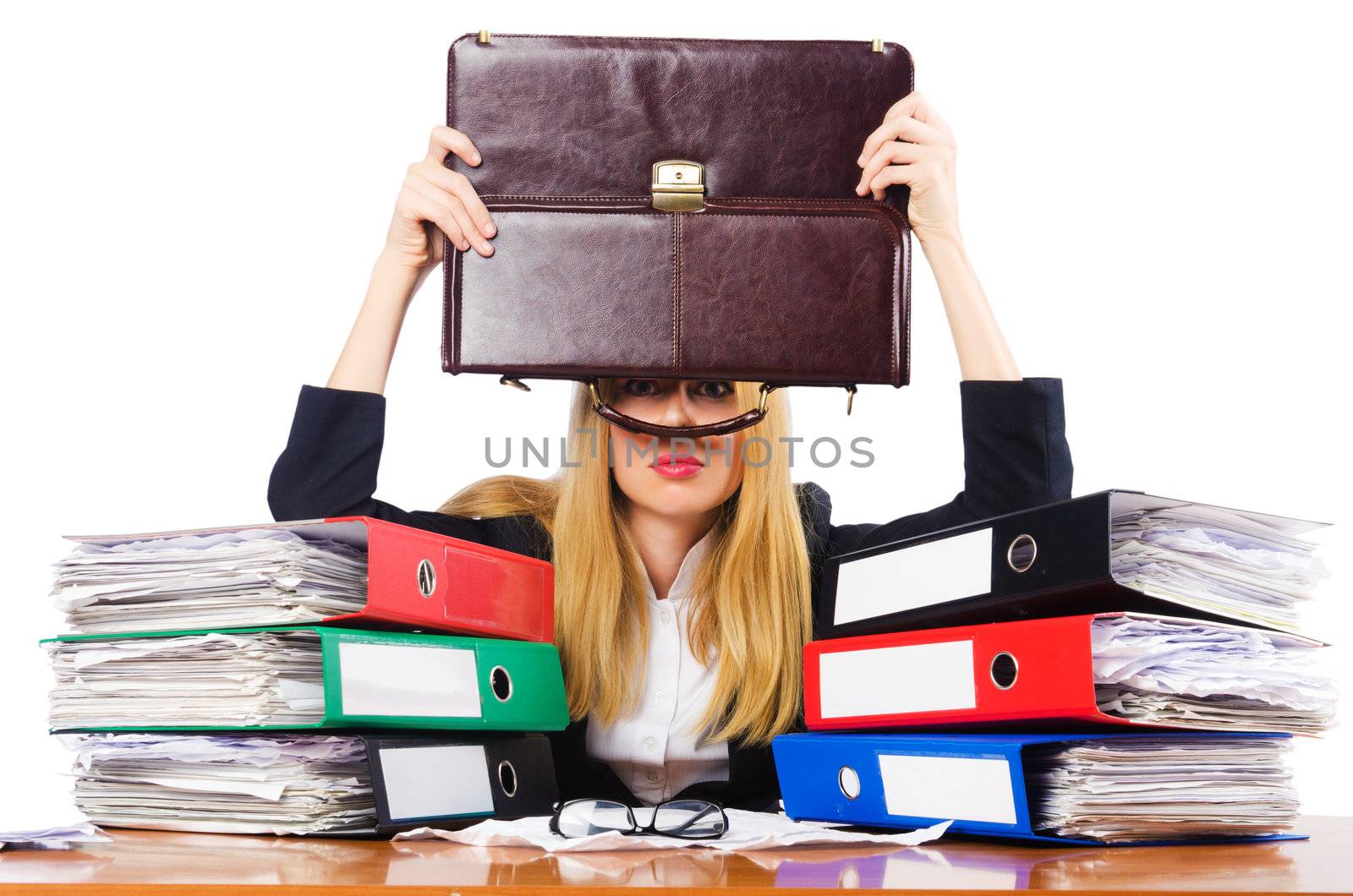 Busy woman with stacks of paper