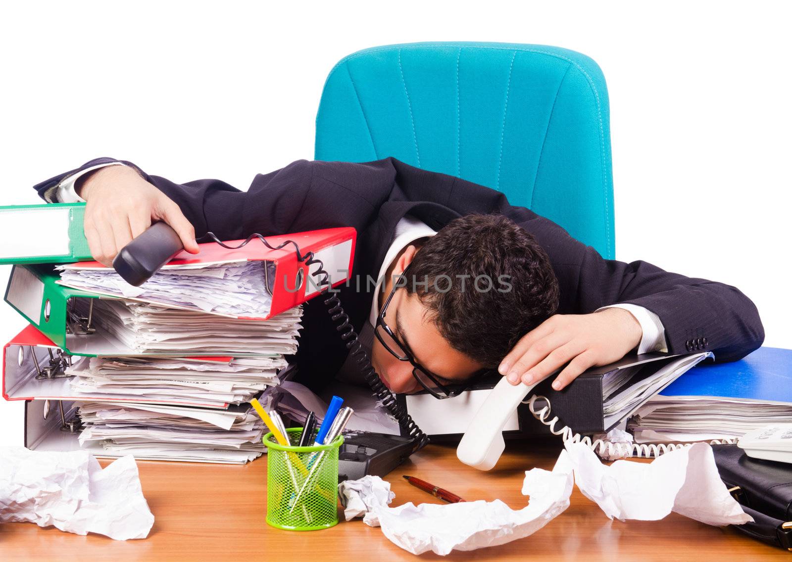 Busy stressed man in the office