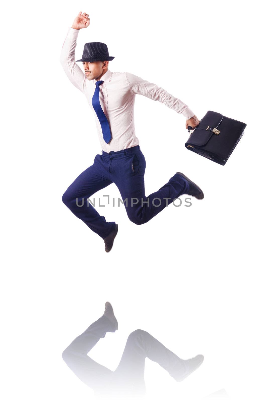 Muscular half naked businessman jumping on white