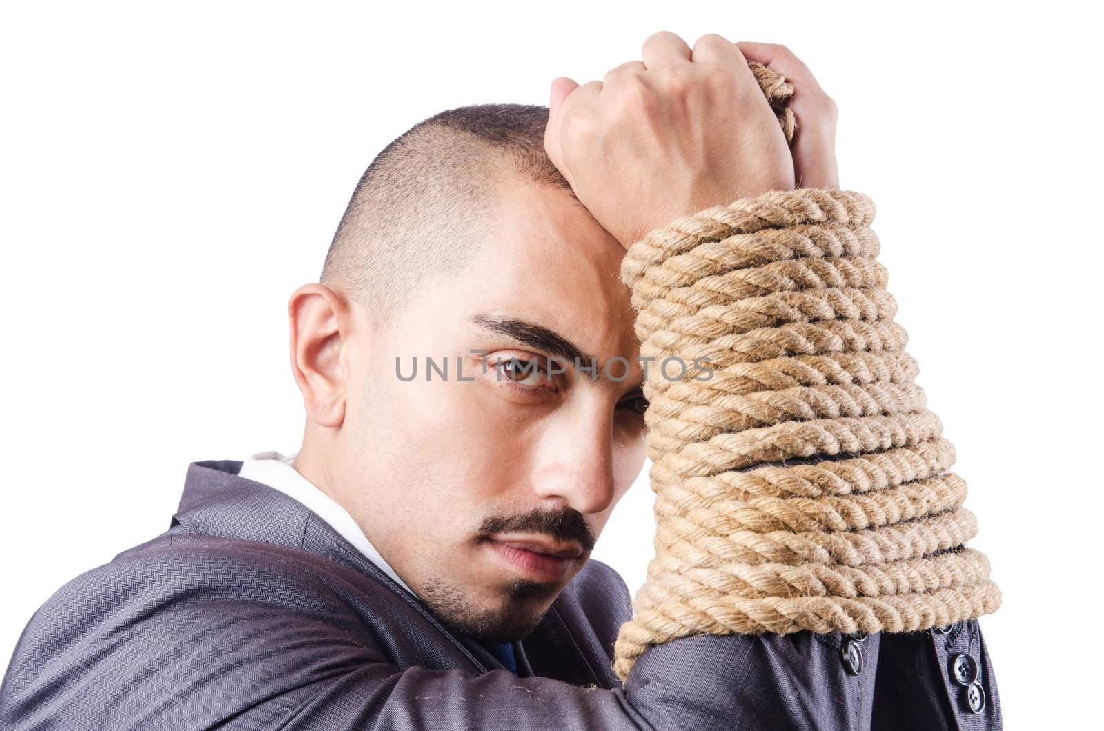 Businessman tied up with rope by Elnur