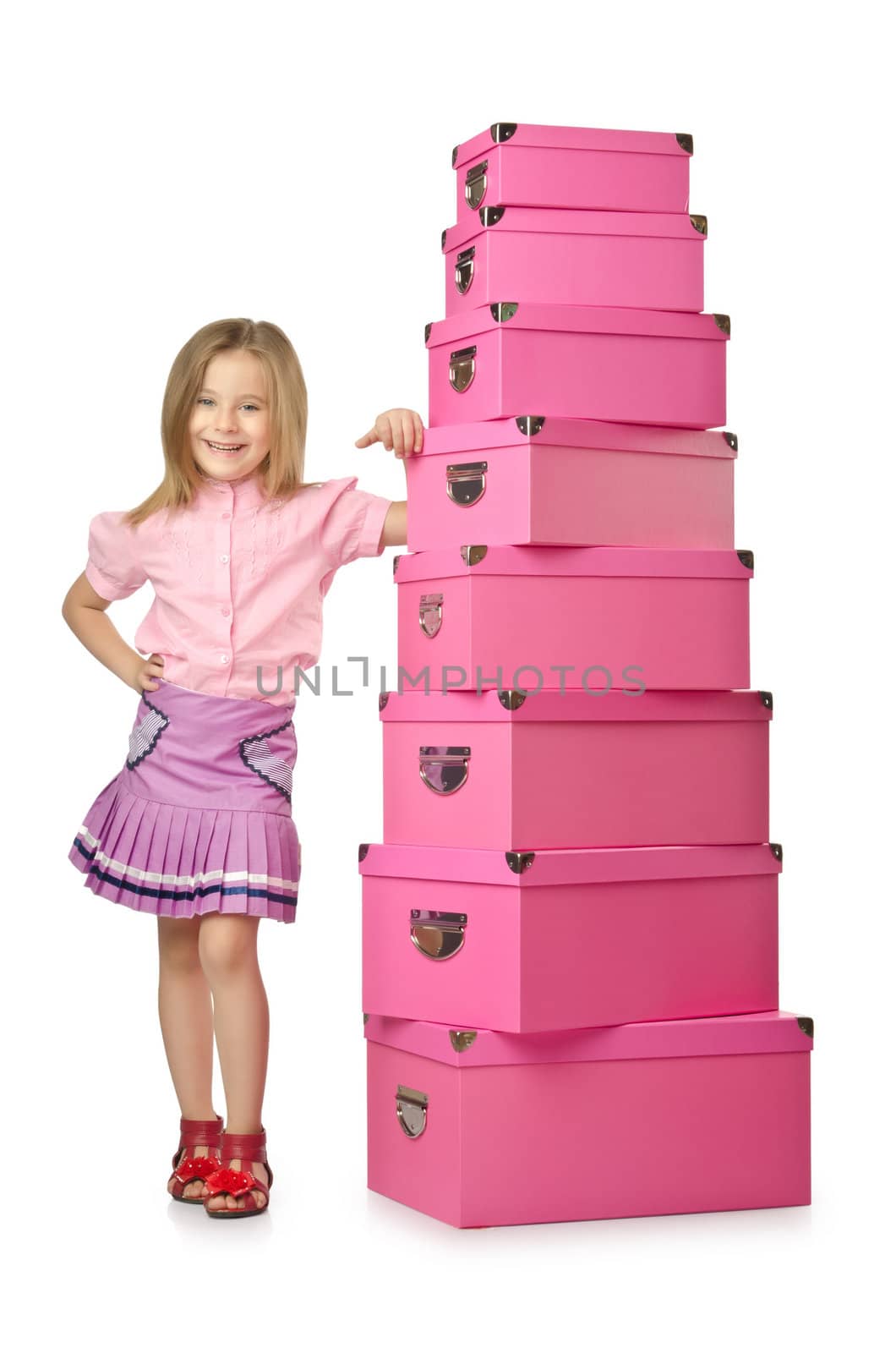 Little cute girl with lots of boxes