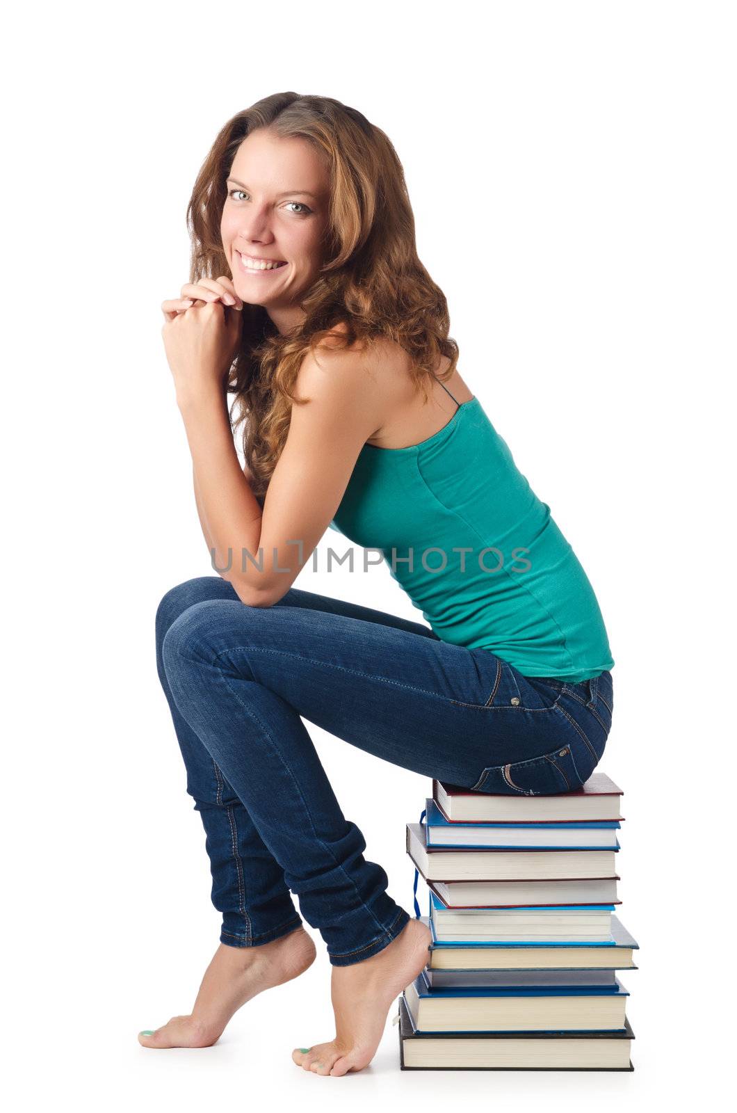 Student sitting on stack of books by Elnur