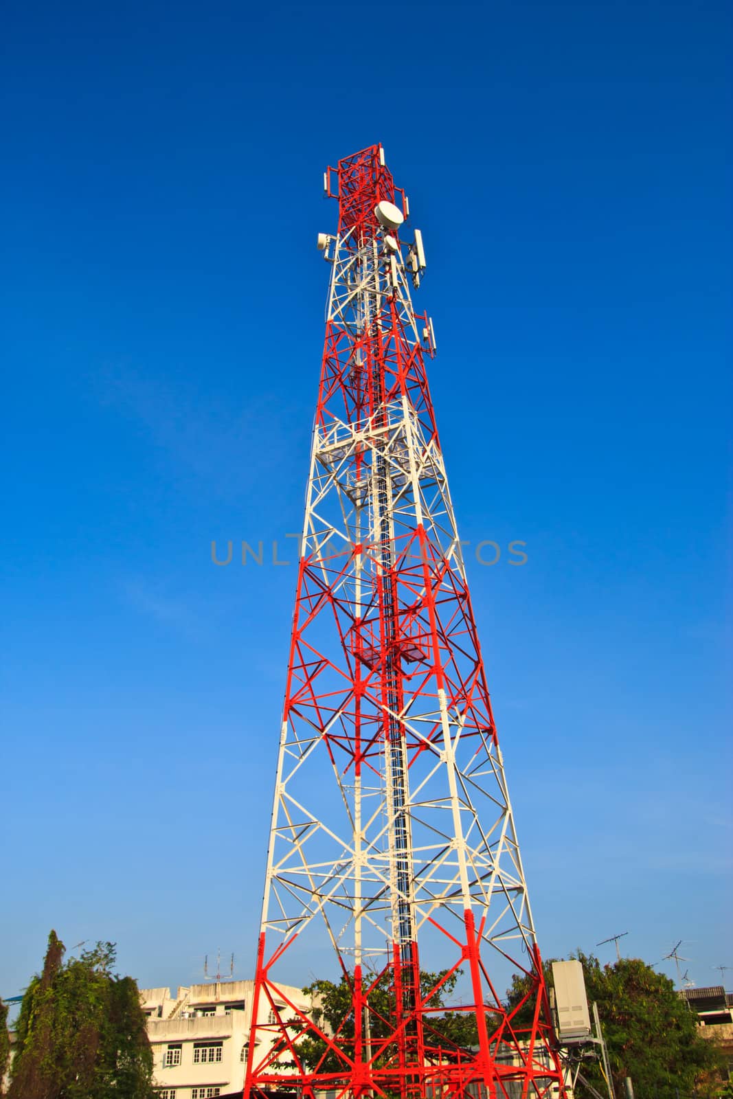 communications tower with a beautiful blue sky  by wasan_gredpree