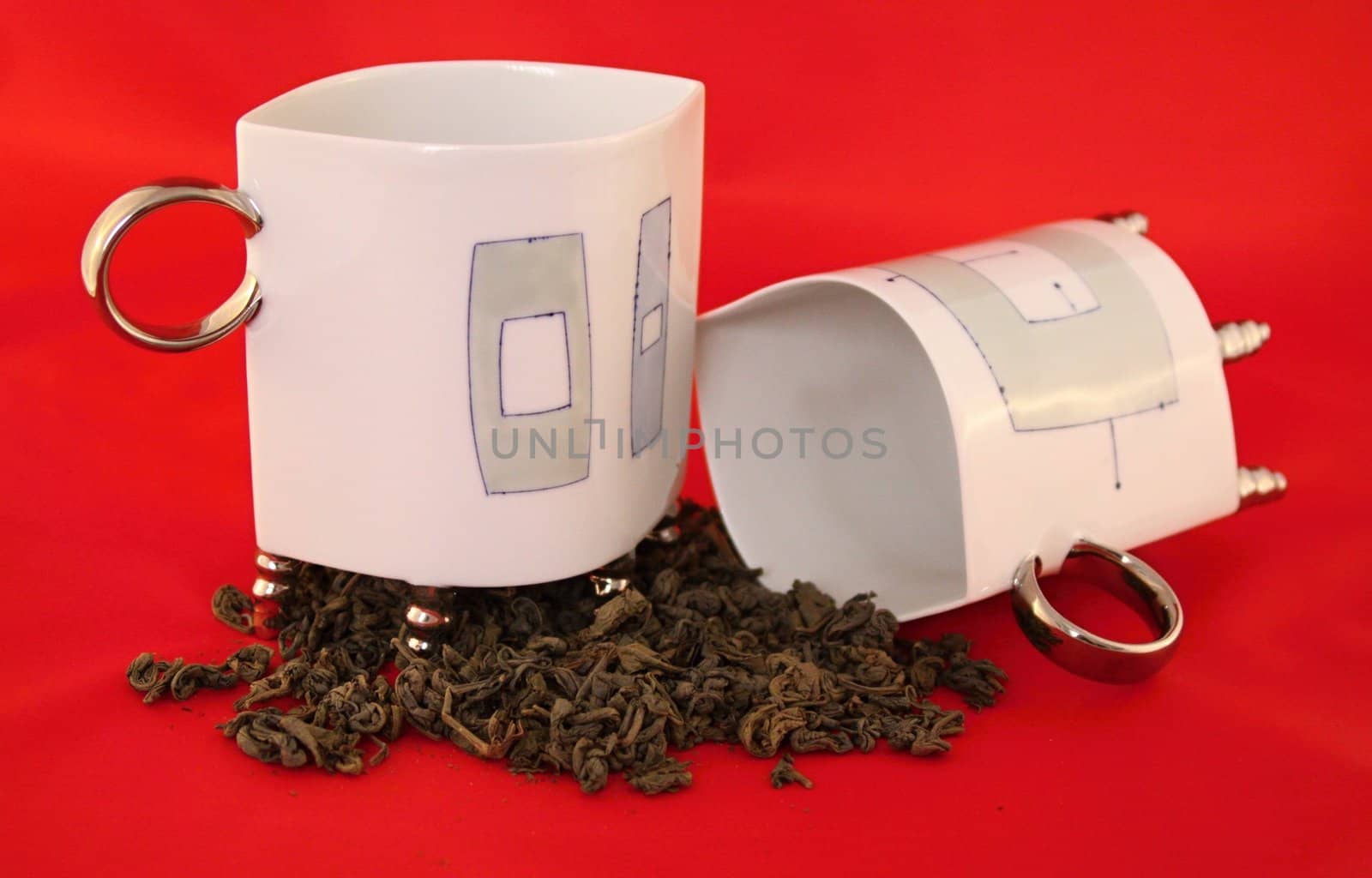 Two cups with leaf green tea