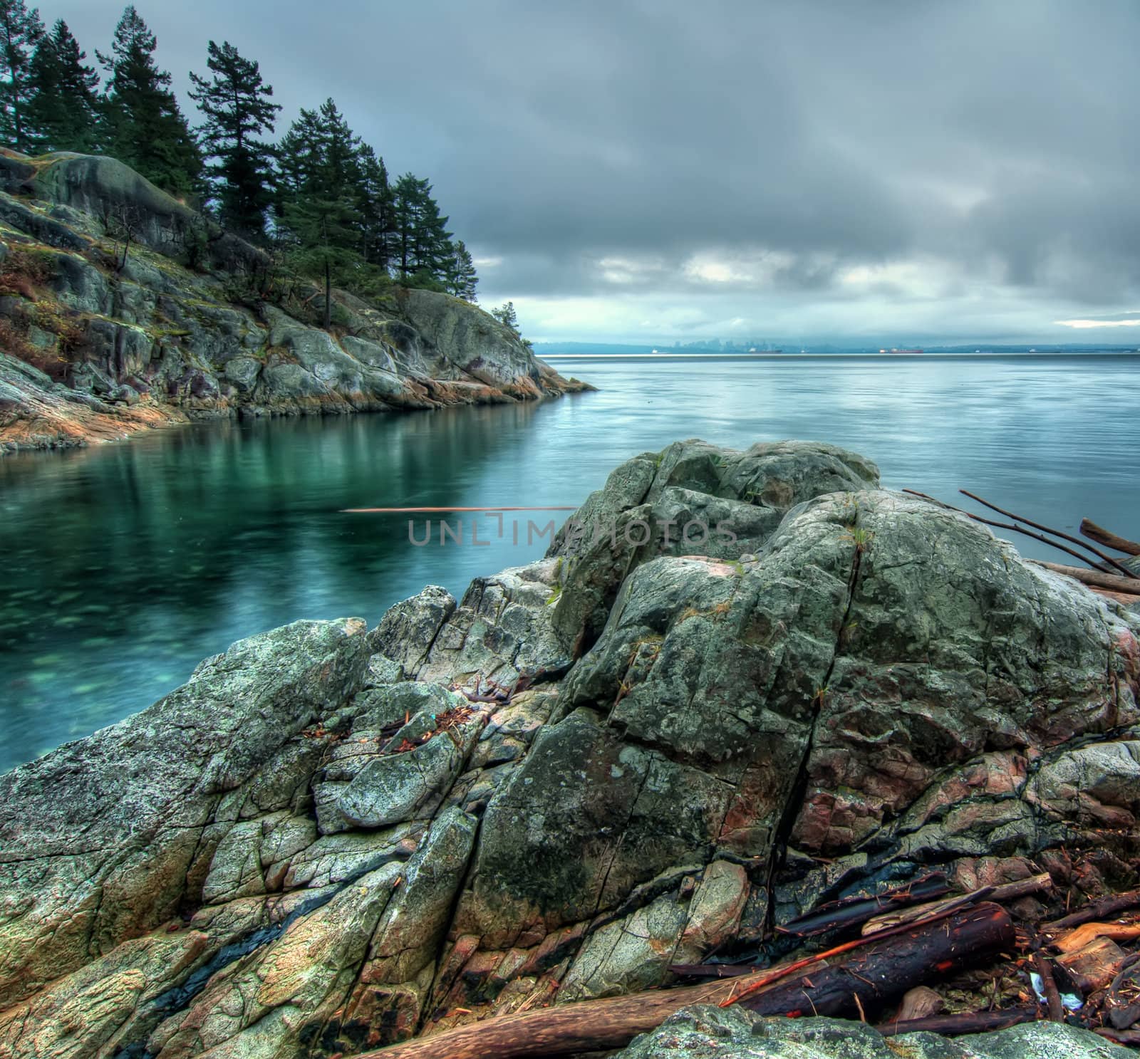 Rocks Along Shore With Cool Tone by JamesWheeler