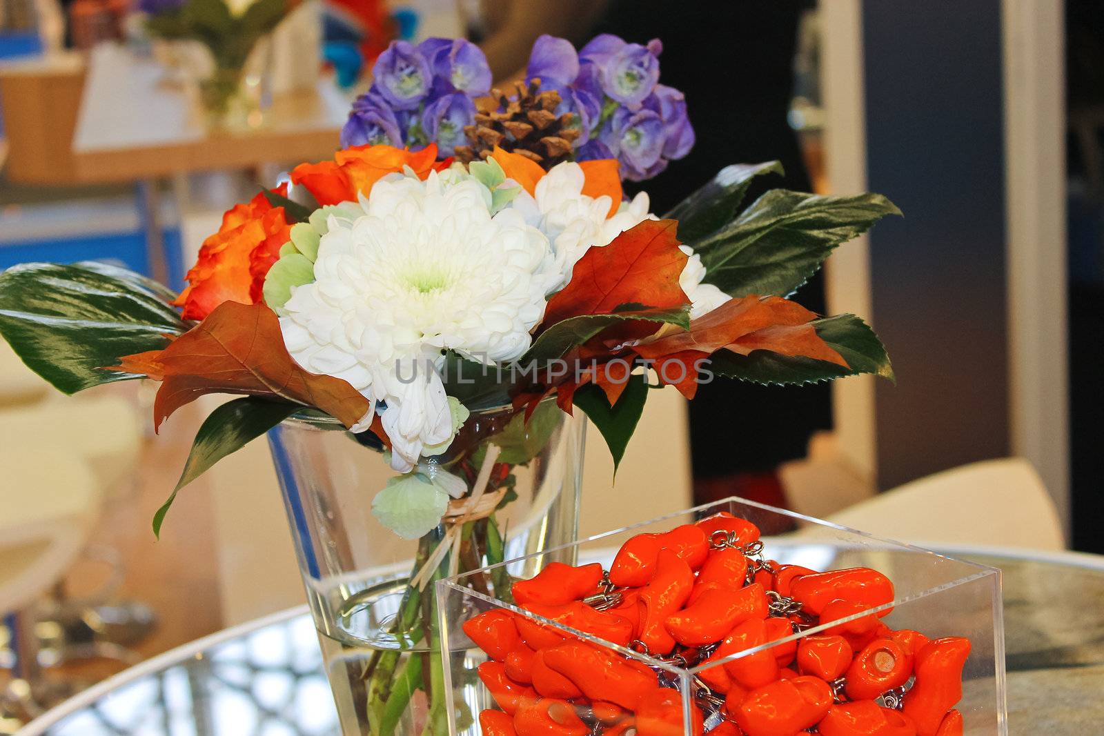 Gift keychains and flowers in interior office by NickNick