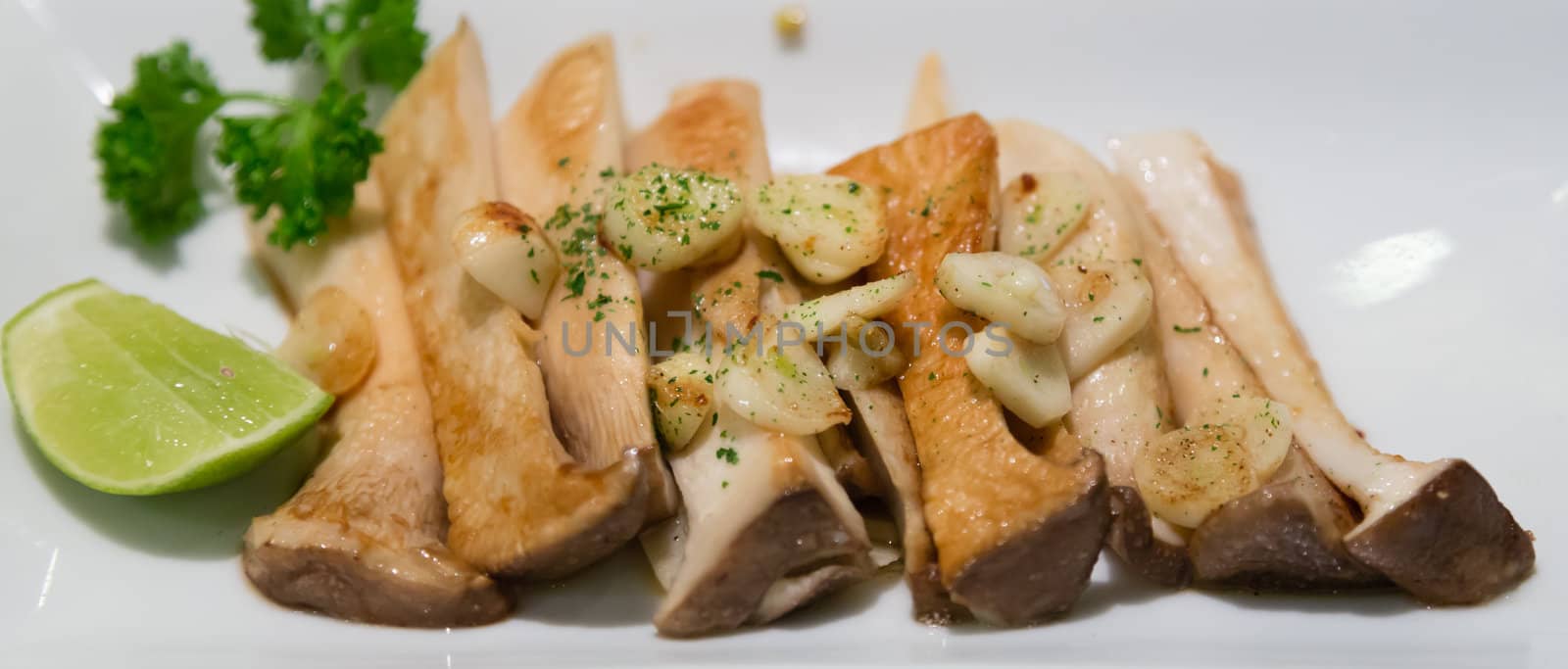 eringi mushrooms fried with garlic japanese food