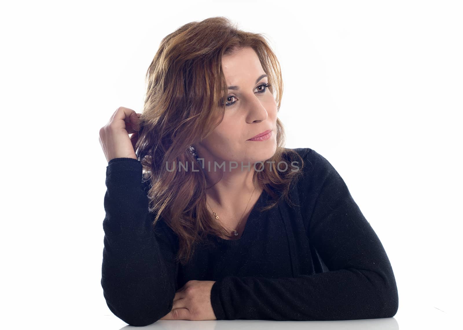 sad woman in front of white background