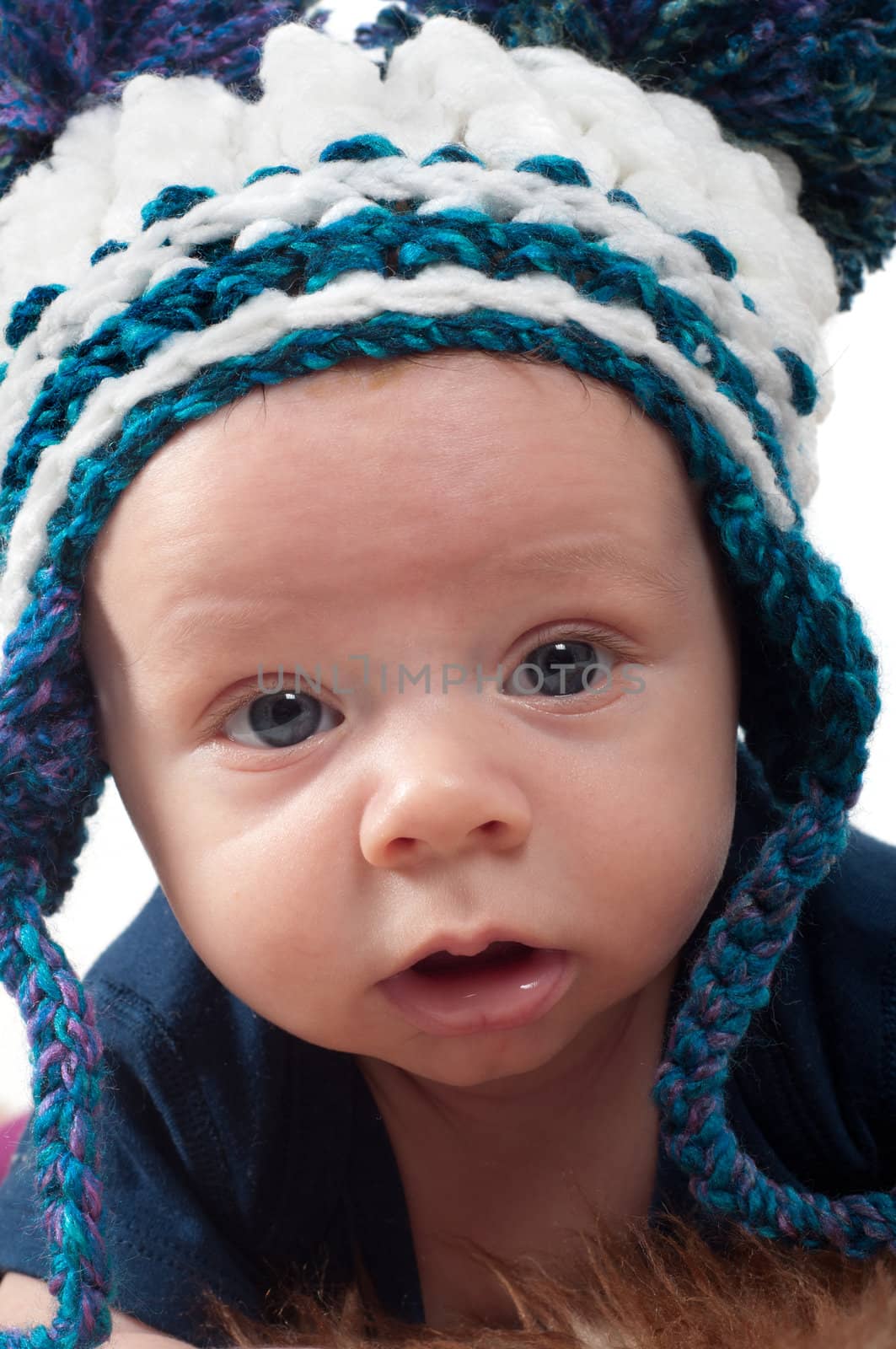 Cute baby in knitted hat by anytka