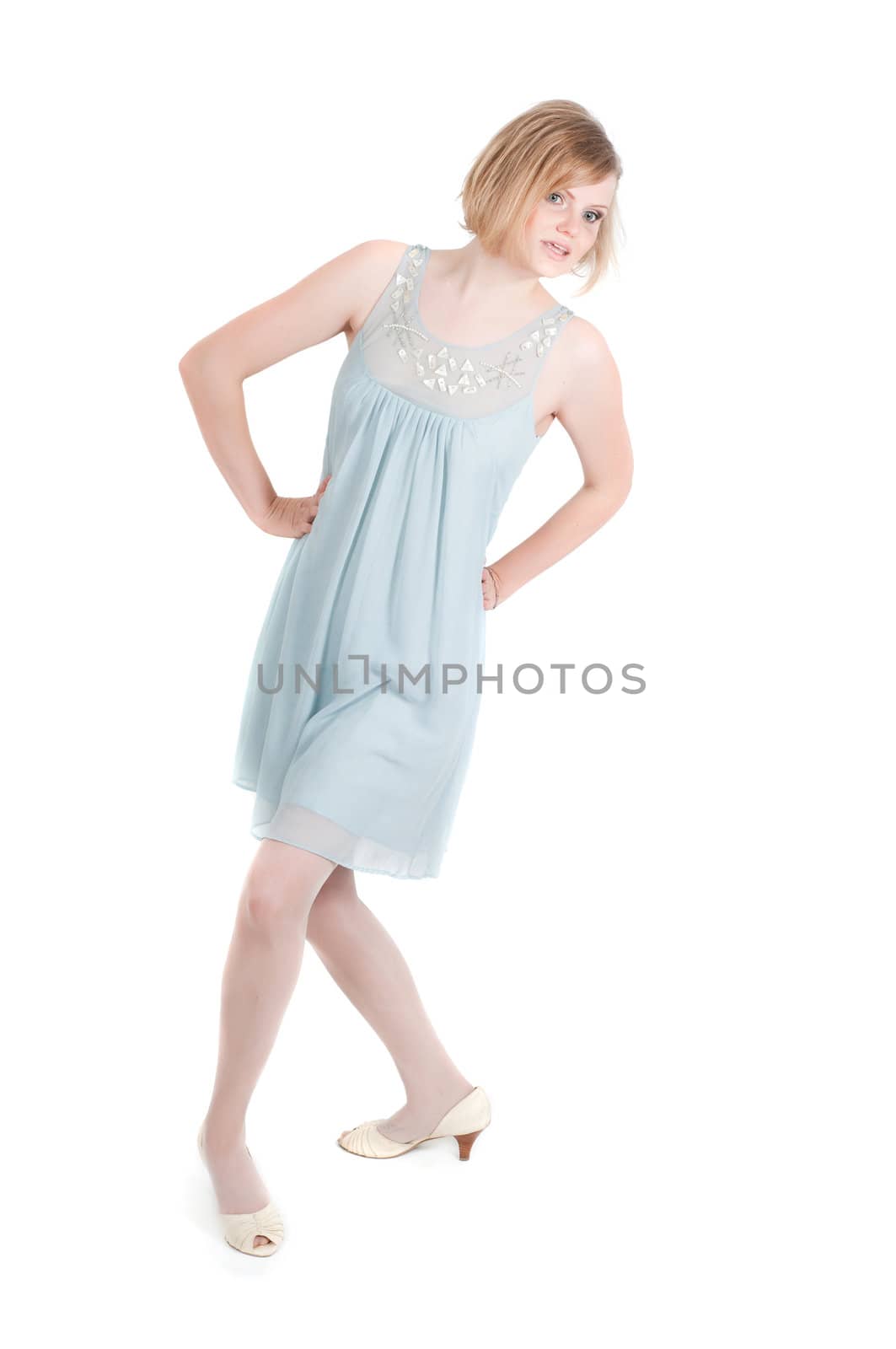 Beautiful woman in blue dress dancing, isolated on white