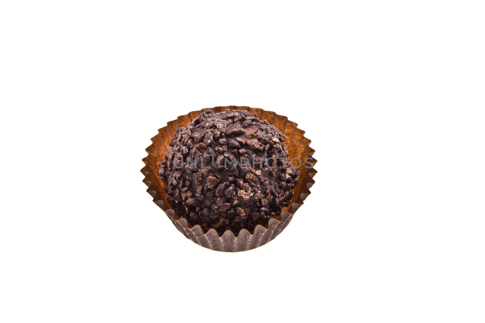 Dark chocolate truffle candy isolated on white by huntz