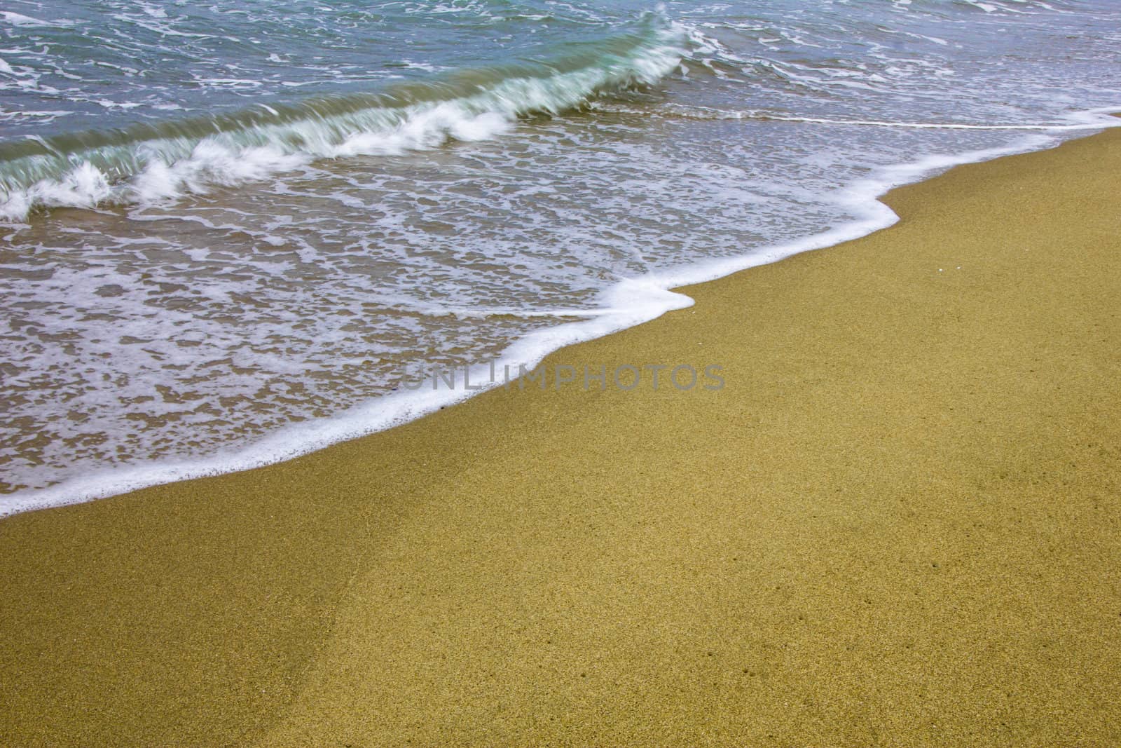 Sea wave on golden beach sand in sunset by huntz