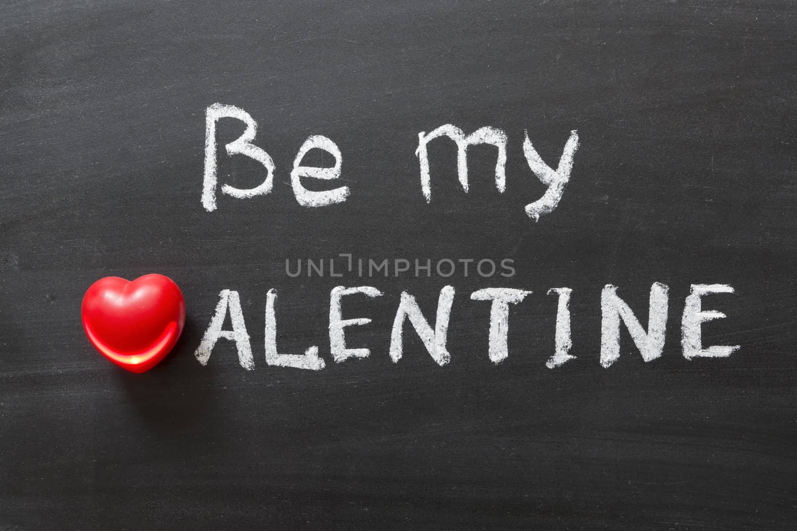 be my valentine phrase handwritten on school blackboard