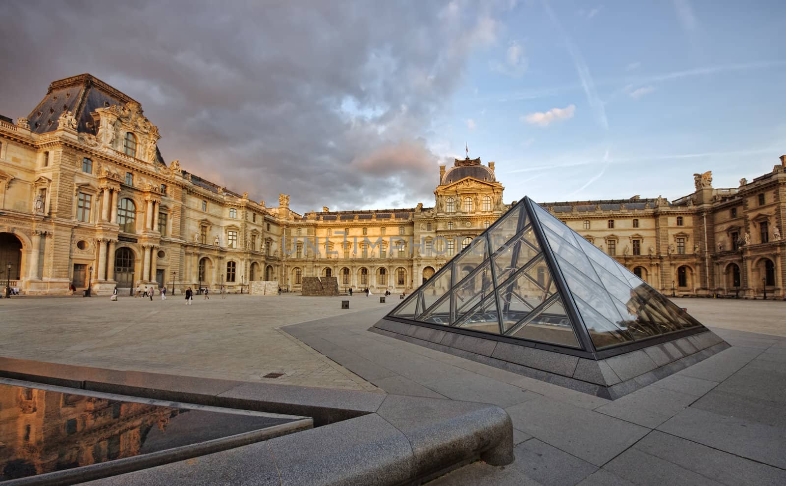 PARIS - SEPT. 22: Louvre museum building on September 22, 2011 at Louvre museum, France. It is consistently the most visited museum in the world with over 8 million annual visitors
