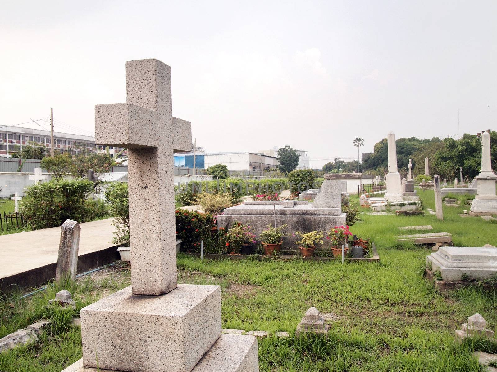 Cross shape gravestone at the cemetery 