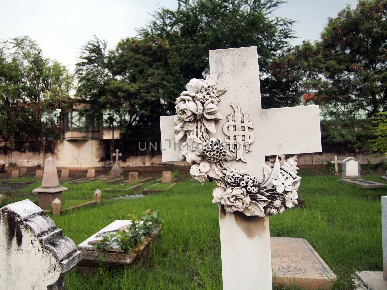 Cross shape gravestone at the cemetery 