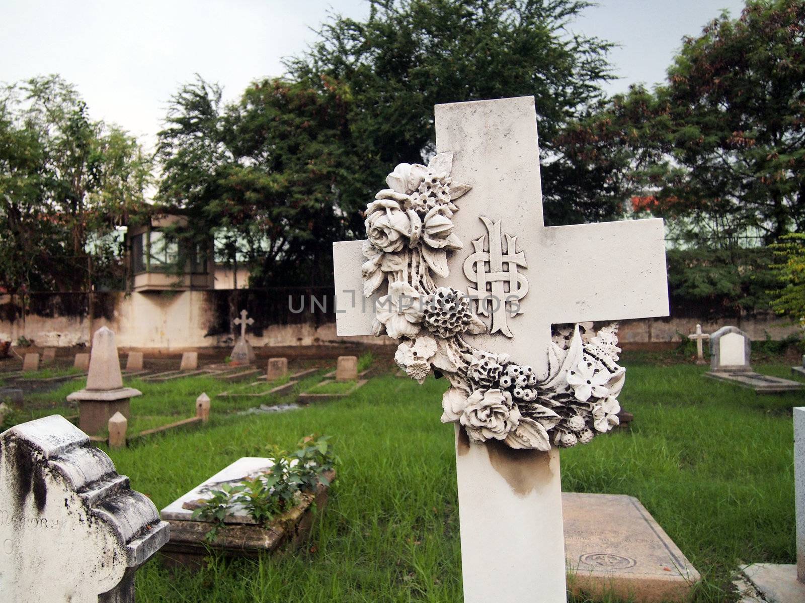 Cross at the cemetery  by siraanamwong