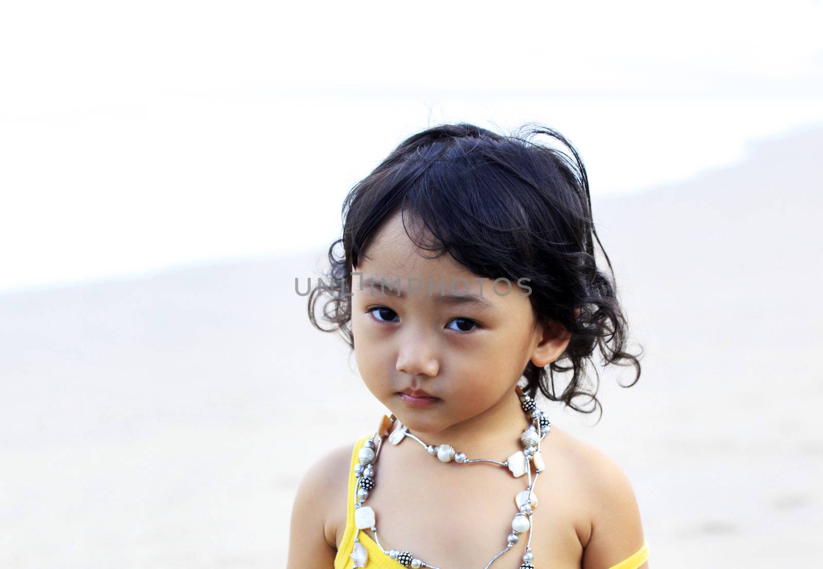 Portrait of the beautiful small Asian girl. Indonesia. Java