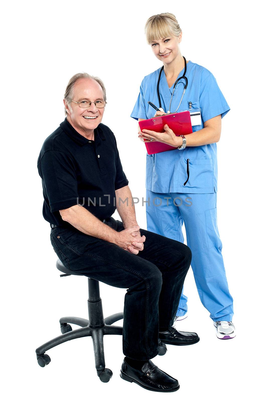 Pleasing doctor collecting patient's health history before annual check up.