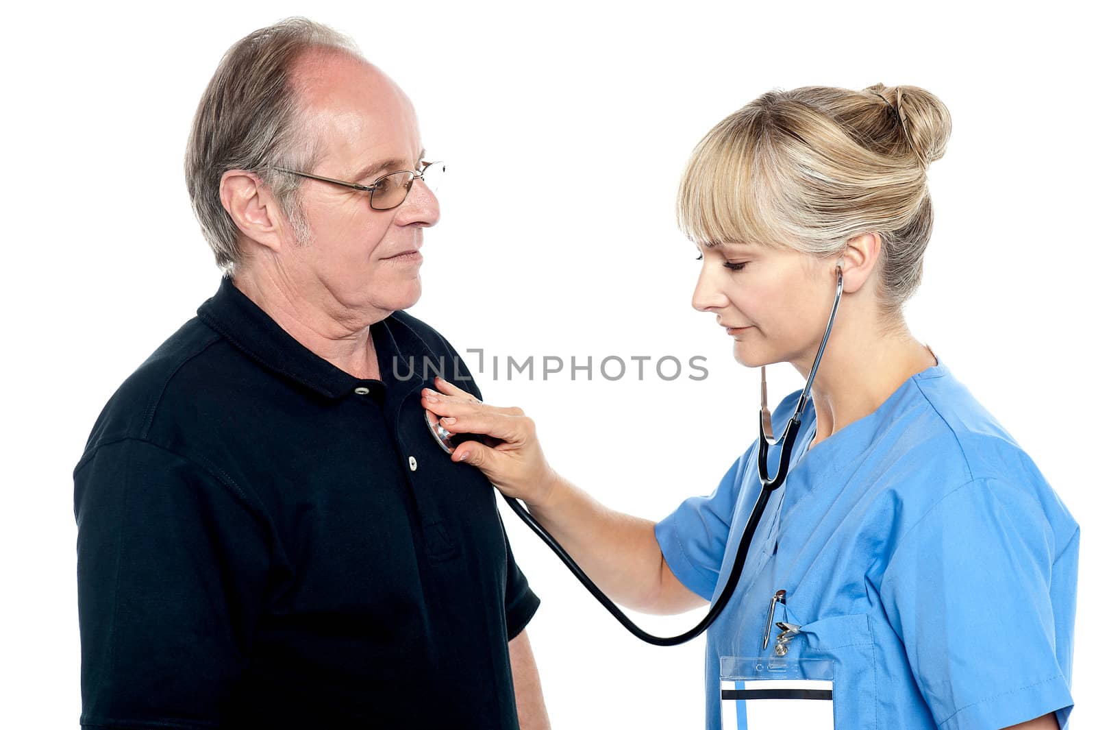 Female doctor examining an elderly man isolated against white background.