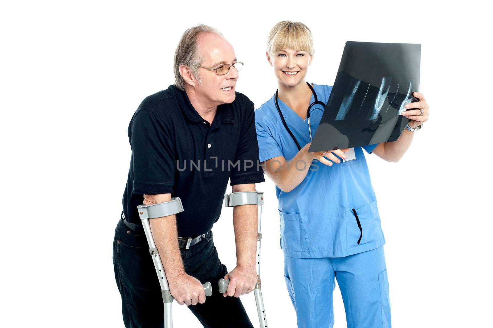 Surgeon showing x-ray sheet to her patient. Damages caused by accident.