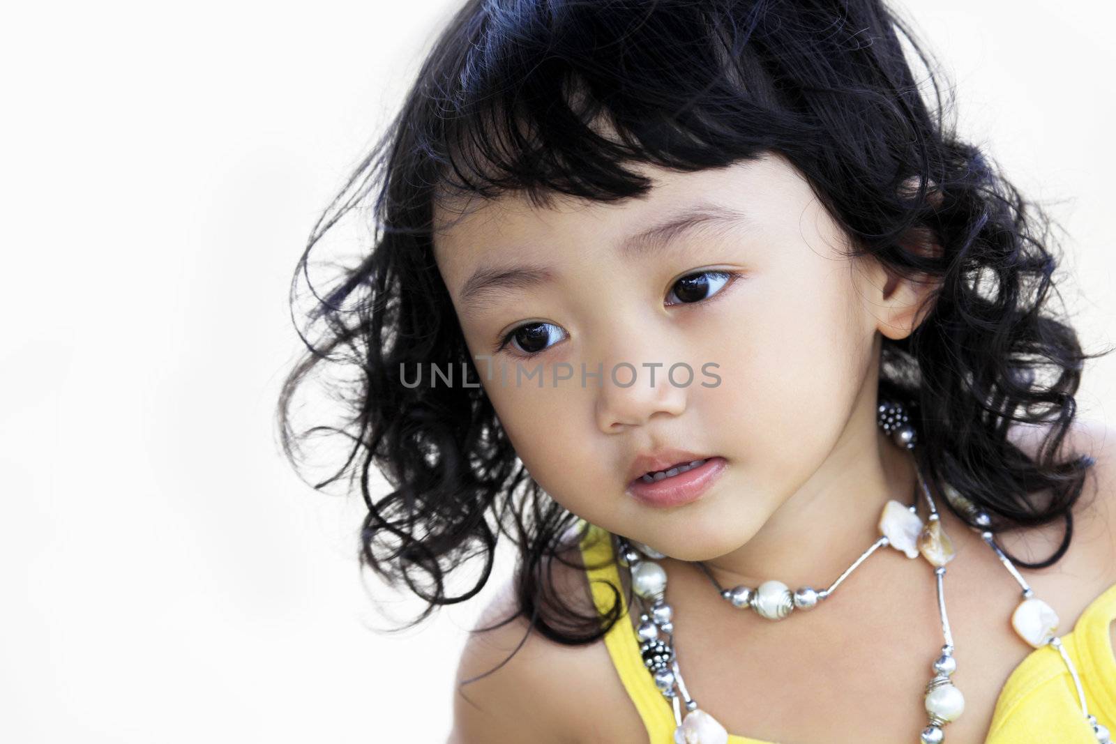 Portrait of the beautiful small Asian girl.  Indonesia. Java