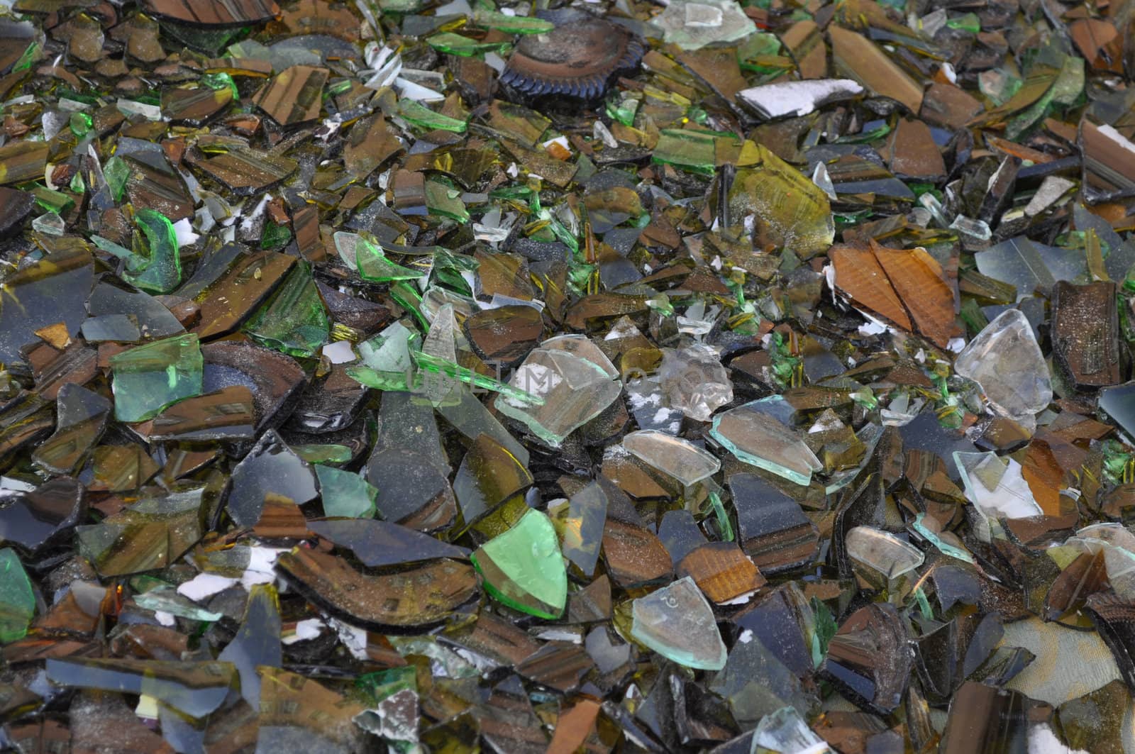 Waste sorting - Broken glass bottle pieces useful as a background